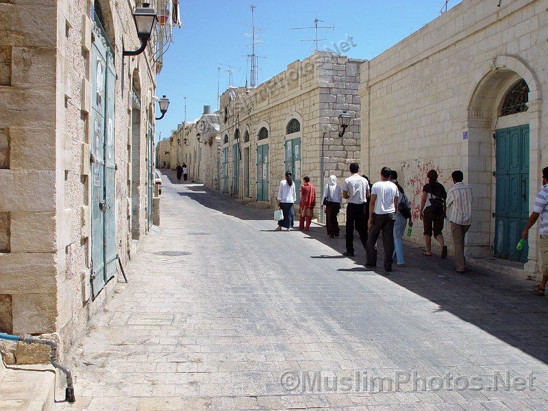 People walking in an empty street